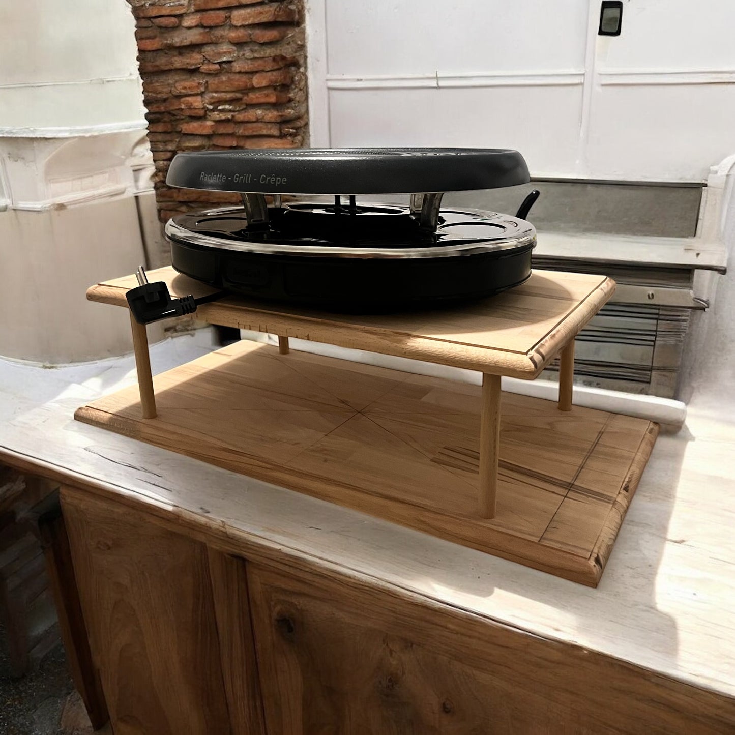 Support machine à raclette
